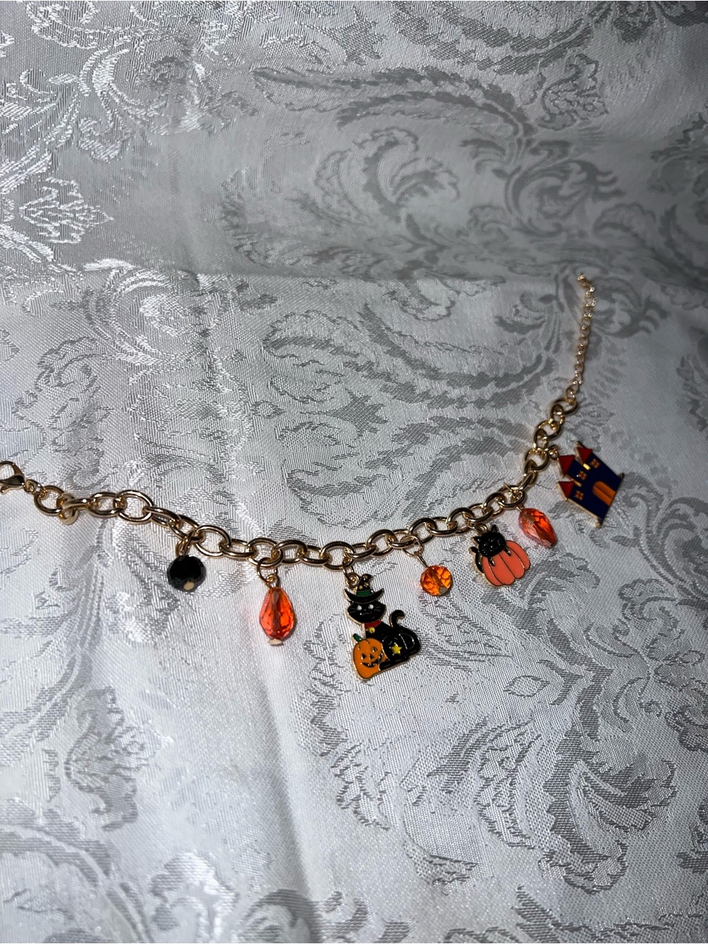Gold-Tone Halloween Charm Bracelet with Orange and Black Accents
